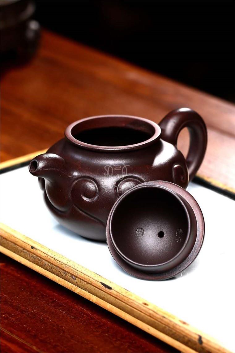 许莘梓作品 如意掇球图片