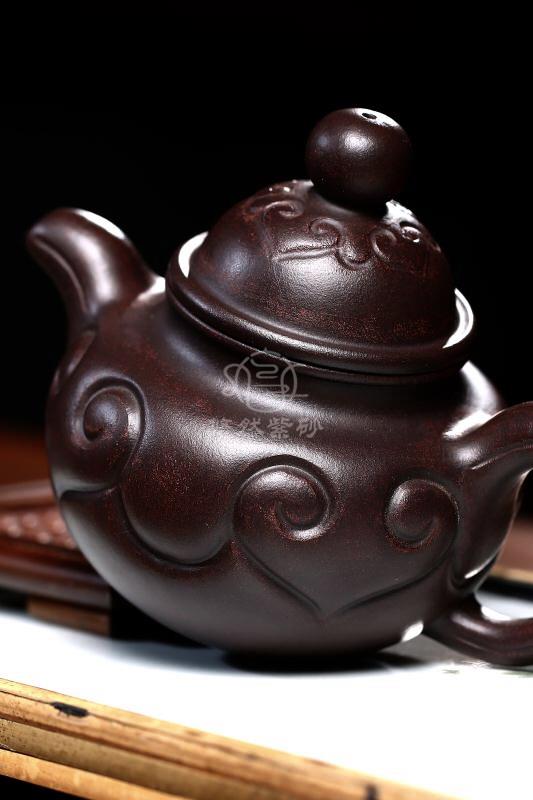 许莘梓作品 如意掇球图片