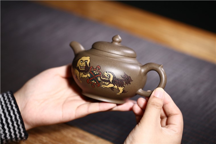 许响新作品 双狮戏球图片