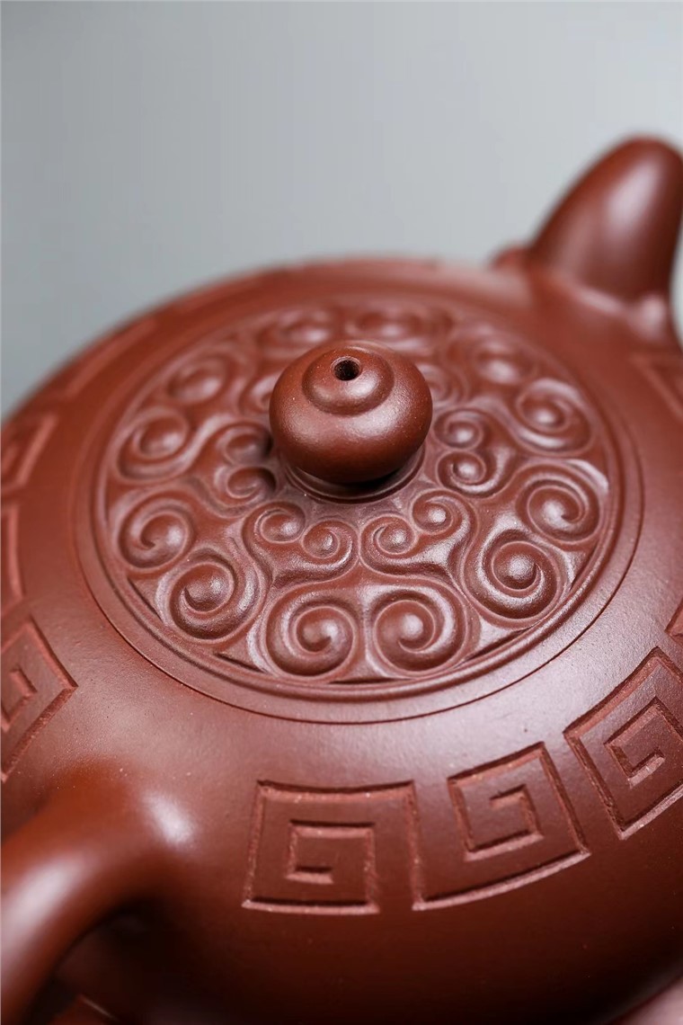 高建中作品 回纹如意图片